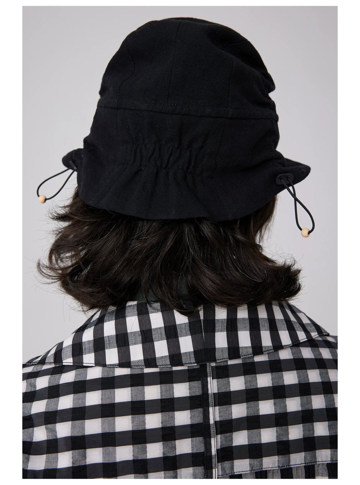 Simple Project Ruched Cotton Linen Hunter Cap - Black back view with ruched crown and drawcords