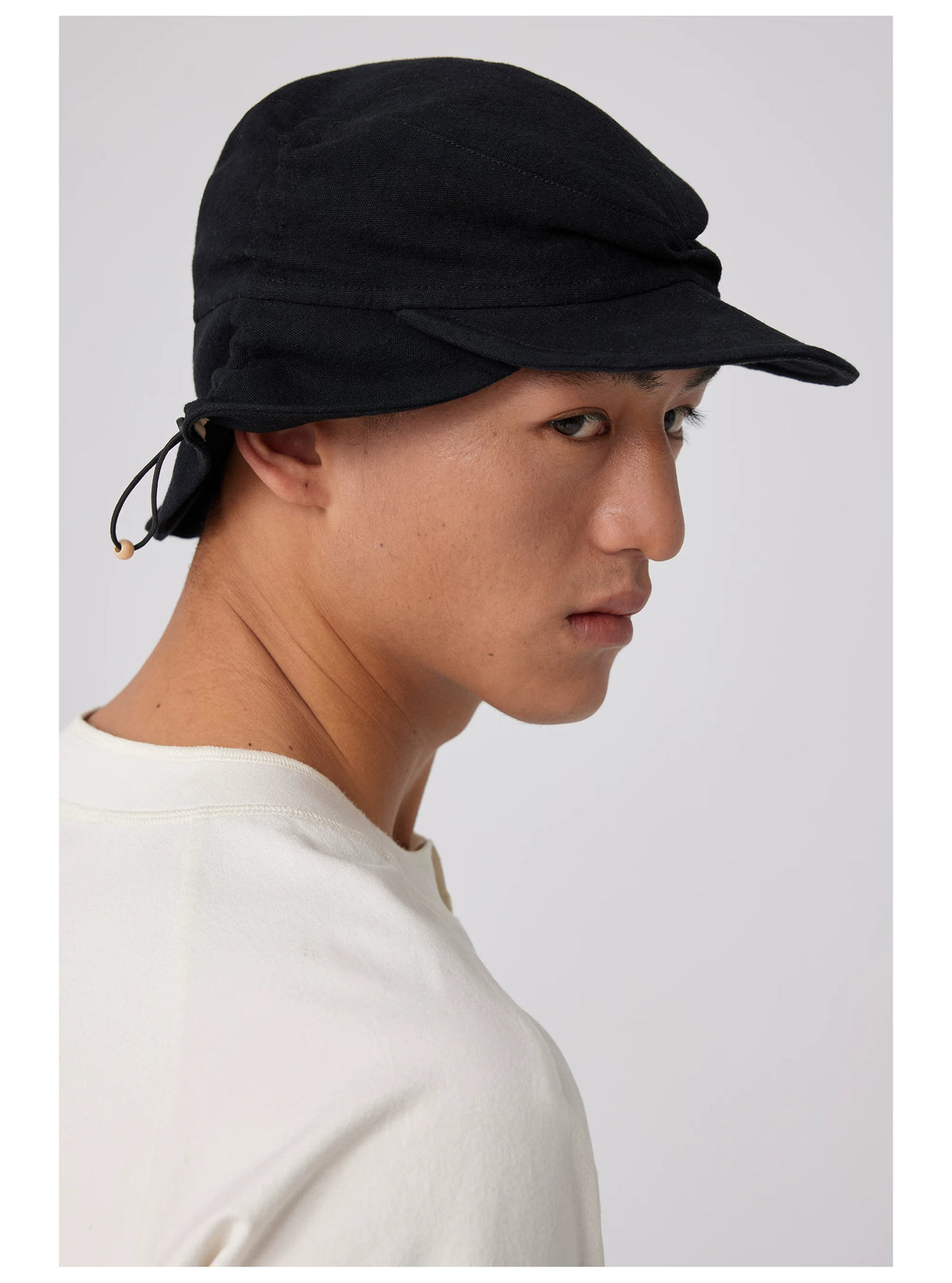 Simple Project Ruched Cotton Linen Hunter Cap - Black side view back drawcord detail